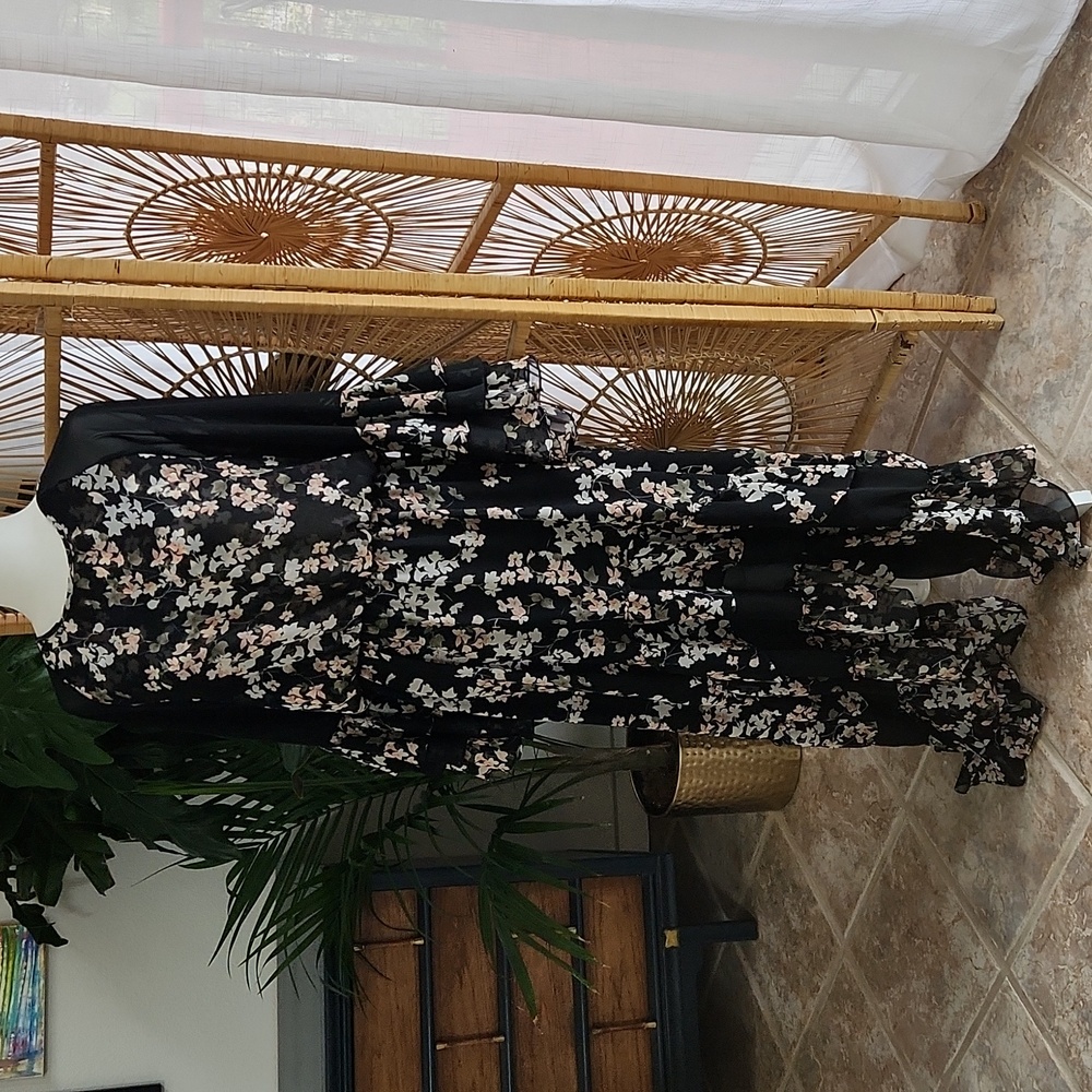 MISA Los Angeles maxi, ruffled sleeve, high-low hem in front, light and flowing.